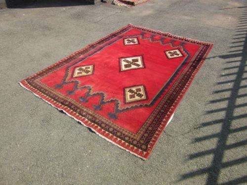 A magnificent vintage Iranian "Sirjani" Bokhtiari Kilim Persian carpet in vibrant red, blues, cream