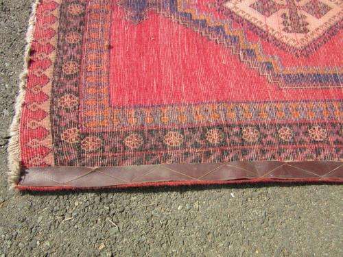 A magnificent vintage Iranian "Sirjani" Bokhtiari Kilim Persian carpet in vibrant red, blues, cream