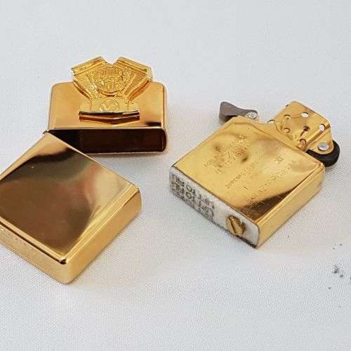 A mega-rare 1995 gold plated Zippo limited edition Harley Davidson "Sculpture V2 Engine" lighter