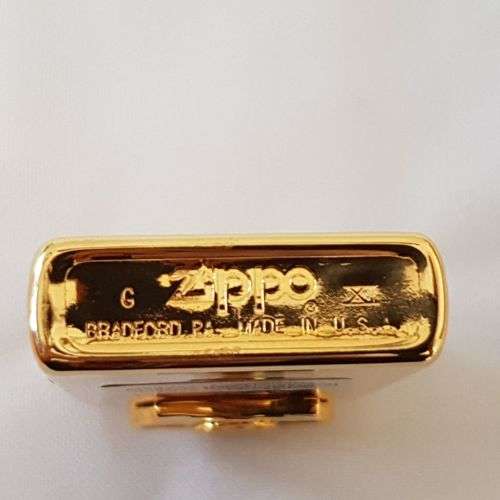 A mega-rare 1995 gold plated Zippo limited edition Harley Davidson "Sculpture V2 Engine" lighter