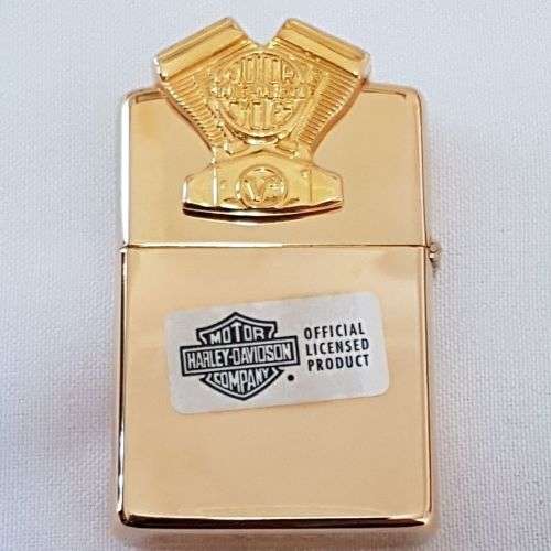 A mega-rare 1995 gold plated Zippo limited edition Harley Davidson "Sculpture V2 Engine" lighter