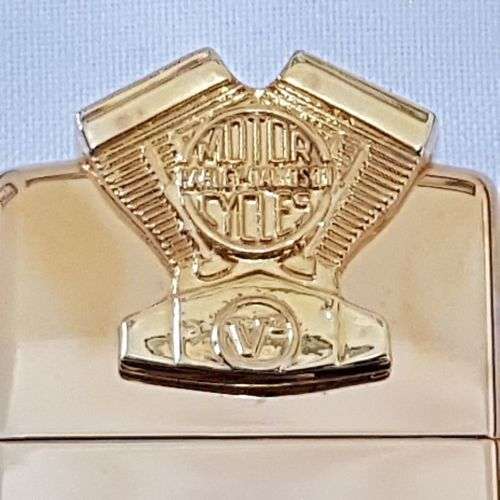 A mega-rare 1995 gold plated Zippo limited edition Harley Davidson "Sculpture V2 Engine" lighter