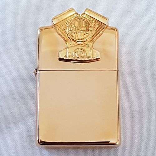 A mega-rare 1995 gold plated Zippo limited edition Harley Davidson "Sculpture V2 Engine" lighter