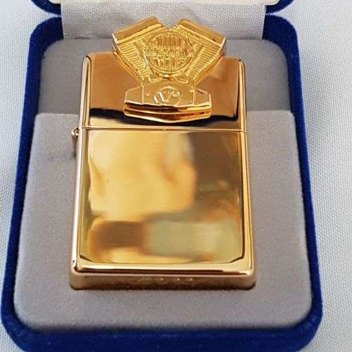 A mega-rare 1995 gold plated Zippo limited edition Harley Davidson "Sculpture V2 Engine" lighter