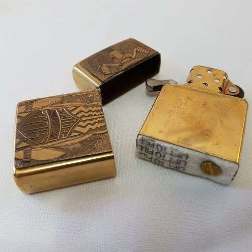 An incredible RARE unused brass Barrett Smythe "Harley Davidson" Tire (tyre) logo Zippo lighter