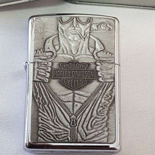 An awesome RARE chromed Barrett Smythe "Harley Davidson" Macho Man Zippo lighter