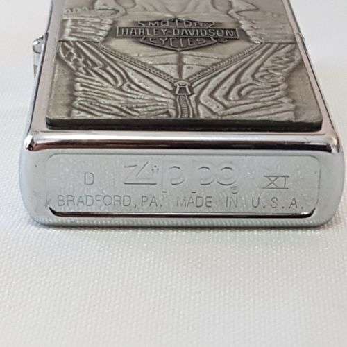 An awesome RARE chromed Barrett Smythe "Harley Davidson" Macho Man Zippo lighter