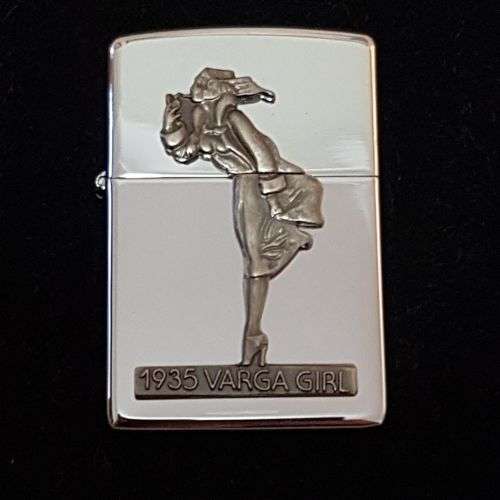 A magnificent 1993 "The Varga Girl 1935" Zippo windproof lighter in original box - very collectable!