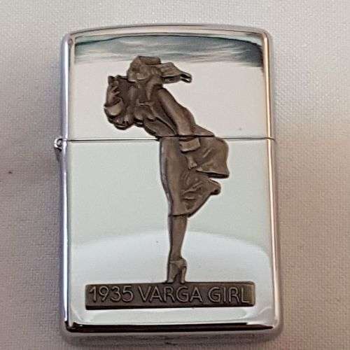 A magnificent 1993 "The Varga Girl 1935" Zippo windproof lighter in original box - very collectable!