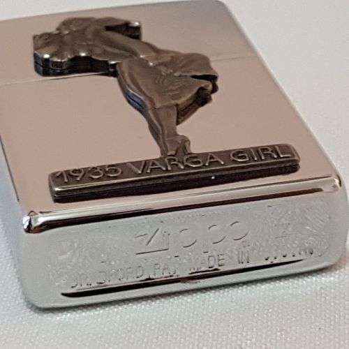 A magnificent 1993 "The Varga Girl 1935" Zippo windproof lighter in original box - very collectable!