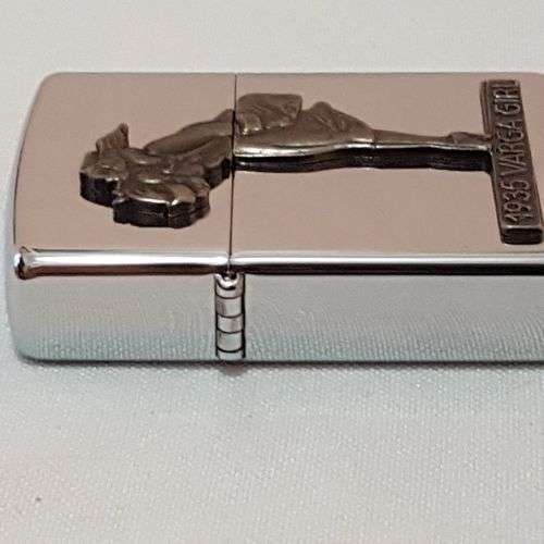 A magnificent 1993 "The Varga Girl 1935" Zippo windproof lighter in original box - very collectable!