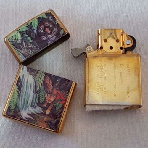 An awesome "Mysteries of the Forest" Jaguar & Cub at Turtle Falls ZIPPO lighter in its tin