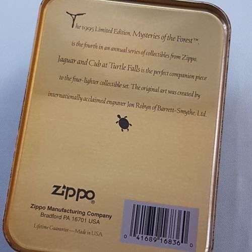 An awesome "Mysteries of the Forest" Jaguar & Cub at Turtle Falls ZIPPO lighter in its tin