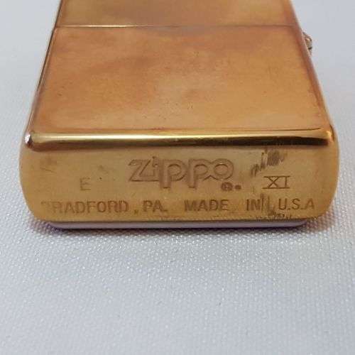 An awesome "Mysteries of the Forest" Jaguar & Cub at Turtle Falls ZIPPO lighter in its tin