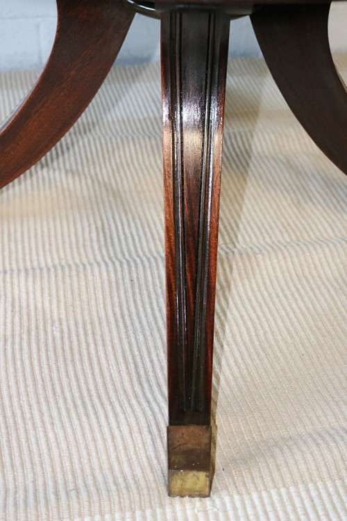 An superb Edwardian (c1910) Mahogany rotating bookcase w/ a solid marble top & marquetry inlays!!