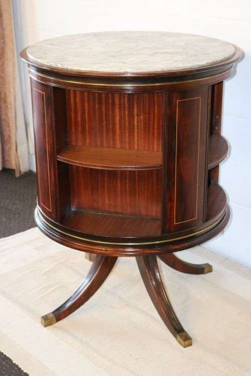 An superb Edwardian (c1910) Mahogany rotating bookcase w/ a solid marble top & marquetry inlays!!