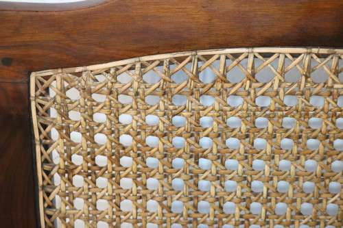 A lovely rattan-back and seat arm chair with ball and claw feet & cabriole legs - great for a patio!