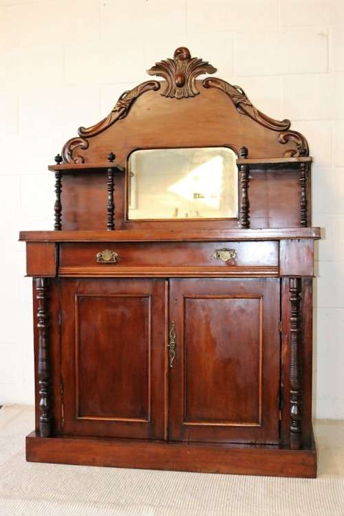 A fantastic carved Victorian (c1880) antique Mahogany chiffonier/ sideboard with turned supports