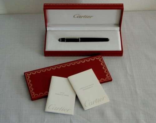 An superb original "Diabolo de Cartier" fountain pen in its presentation box with the certificate