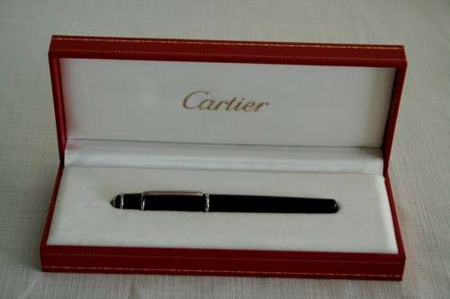 An superb original "Diabolo de Cartier" fountain pen in its presentation box with the certificate