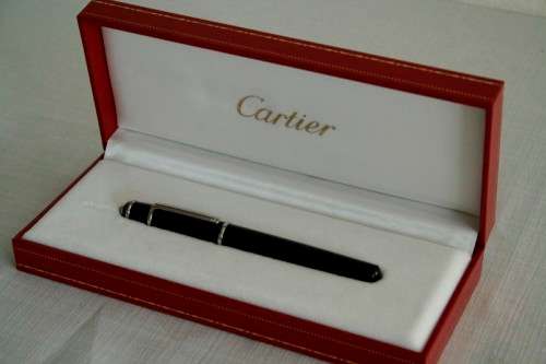 An superb original "Diabolo de Cartier" fountain pen in its presentation box with the certificate