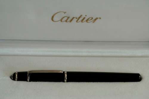 An superb original "Diabolo de Cartier" fountain pen in its presentation box with the certificate