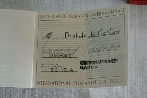An superb original "Diabolo de Cartier" fountain pen in its presentation box with the certificate