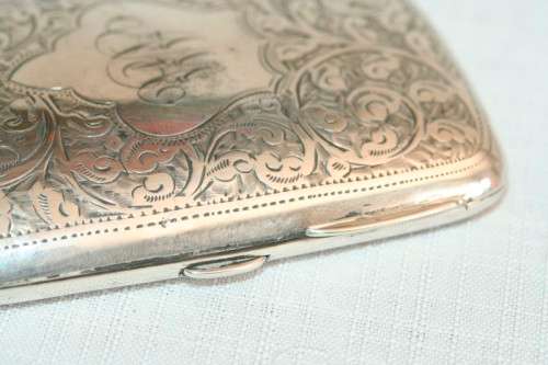 An exquisite antique (1905) hallmarked "Thomas Bishton" sterling silver engraved calling card case