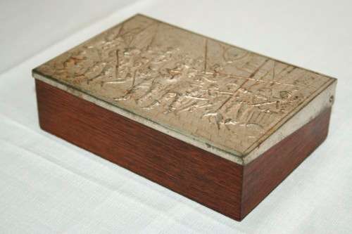 A fabulous vintage Dutch silver metal cigarette box with Rembrandt's "Night Watch" scene on the lid