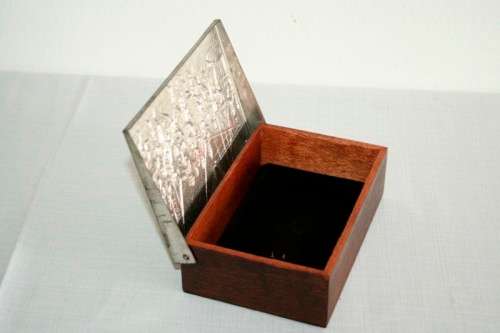 A fabulous vintage Dutch silver metal cigarette box with Rembrandt's "Night Watch" scene on the lid