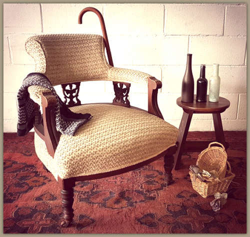 A wonderful antique Edwardian upholstered library armchair on its original castors - stunning!