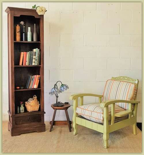 An incredible tall wooden bookcase with three spacious shelves and a bottom drawer - stunning!!