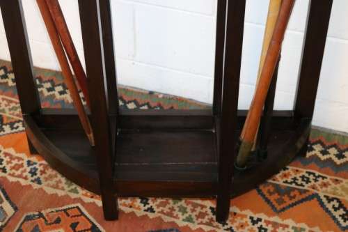 A wonderful tall hall stand with three mirrors, storage drawer and space for umbrellas/ canes
