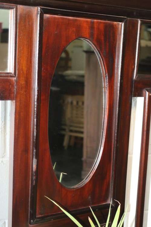 A wonderful tall hall stand with three mirrors, storage drawer and space for umbrellas/ canes