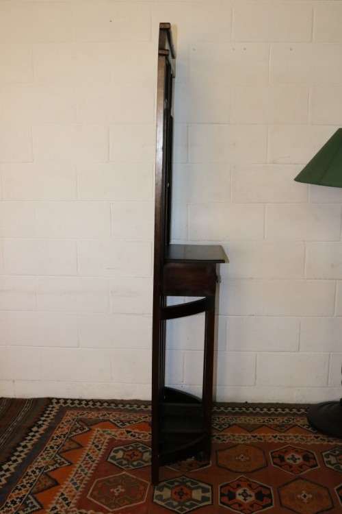 A wonderful tall hall stand with three mirrors, storage drawer and space for umbrellas/ canes