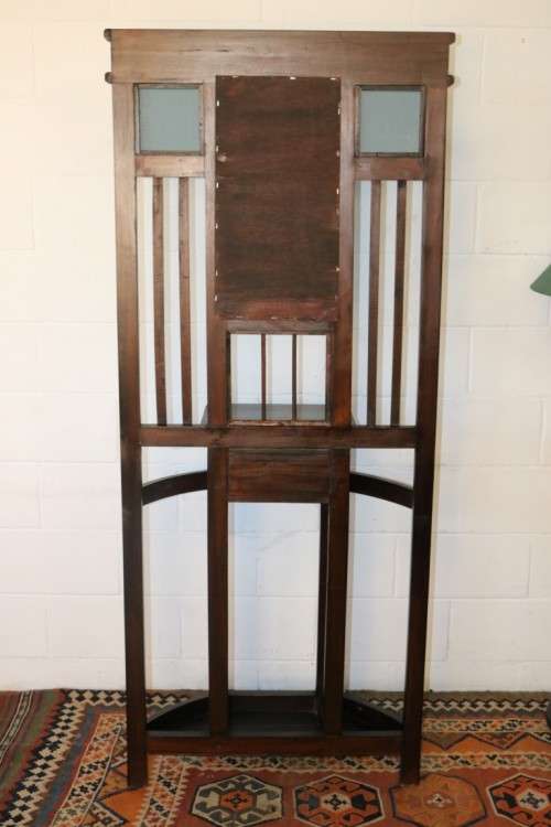 A wonderful tall hall stand with three mirrors, storage drawer and space for umbrellas/ canes