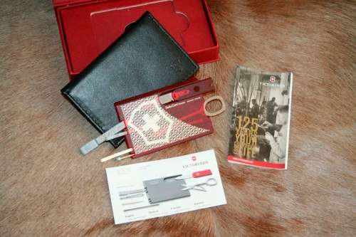 An awesome collectable Victorinox 125 year anniversary Special Edition Swiss Card knife & wallet