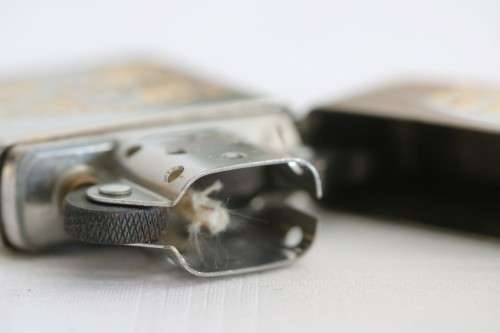 A RARE original "Pearl Harbor 60th Anniversary" silver plated  Zippo  - unused and in a box