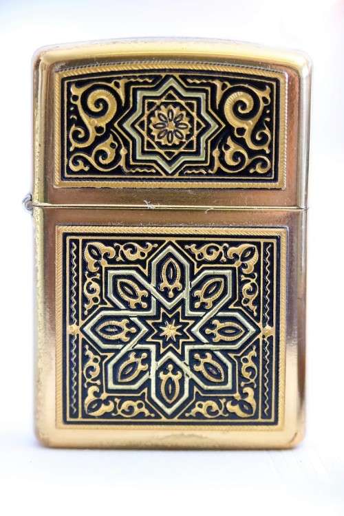 In incredible original Zippo with an amazing intricate design and a Brass finish in the original box