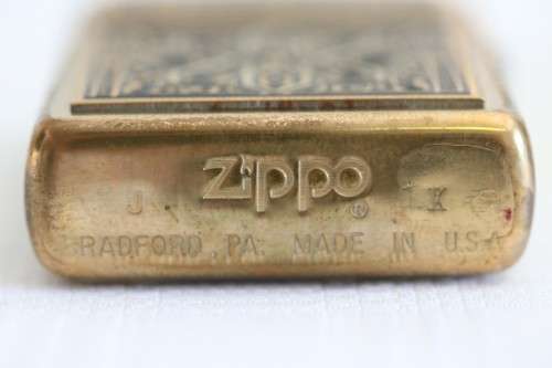 In incredible original Zippo with an amazing intricate design and a Brass finish in the original box