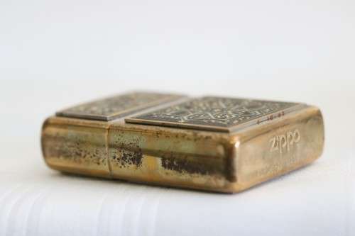 In incredible original Zippo with an amazing intricate design and a Brass finish in the original box