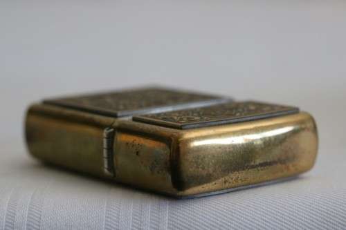 In incredible original Zippo with an amazing intricate design and a Brass finish in the original box