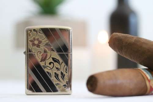 An original silver plated Zippo "limited edition" floral etched design lighter in its box
