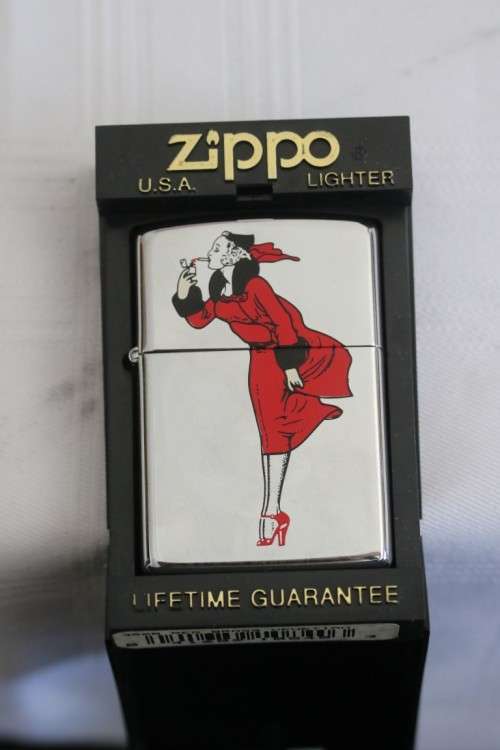 An incredible original Zippo limited edition "Windy the Windproof Beauty - The Varga Girl" lighter!!