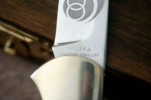 A rare and very collectable limited number 73/100 Puma 4-star "Windhoek Centennial" folding knife