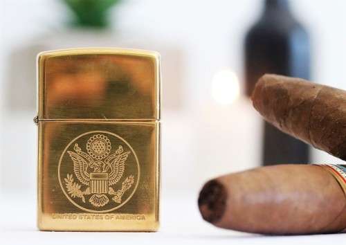 A wonderful original Gold tone Zippo "United States of America" lighter in the original box