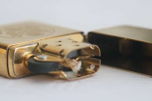 A wonderful original Gold tone Zippo "United States of America" lighter in the original box