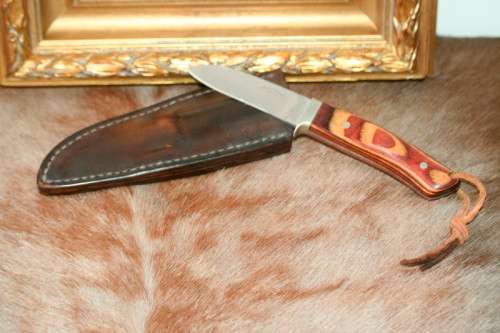 A beautifully custom hand-made original "Brent E Sandow" hunter knife in its original leather sheath