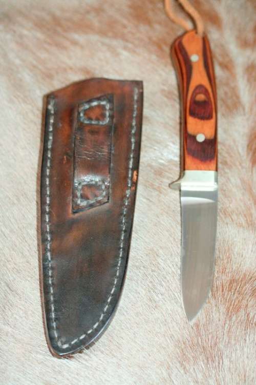 A beautifully custom hand-made original "Brent E Sandow" hunter knife in its original leather sheath
