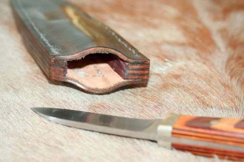 A beautifully custom hand-made original "Brent E Sandow" hunter knife in its original leather sheath